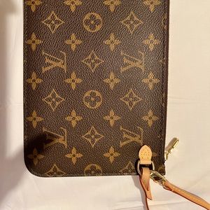 Brand NEW! Never worn. Louis Vuitton Neverfull Pochette Monogram Pochette ONLY!